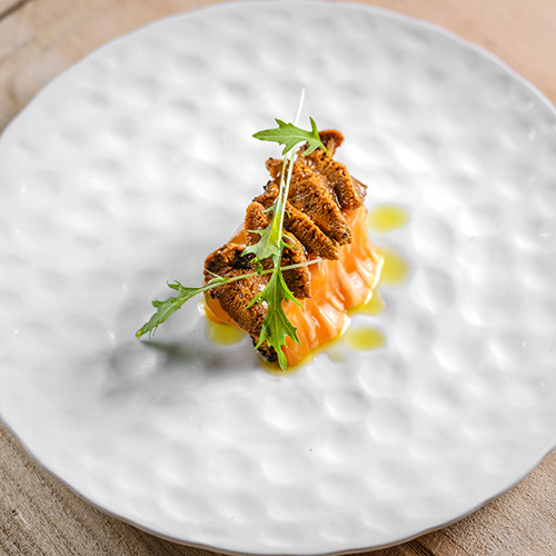 Fotografía gastronómica, emplatado con luz profesional.